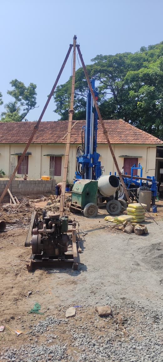 Tripod piling equipment on site